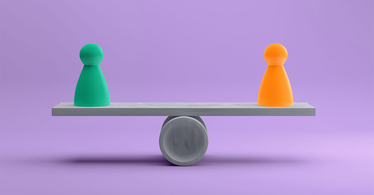 Two game pieces balancing on a see-saw showing the pros and cons of in-house and outsourced marketing from The Great Debate: In-House vs. Outsourced Marketing article by Design At Work