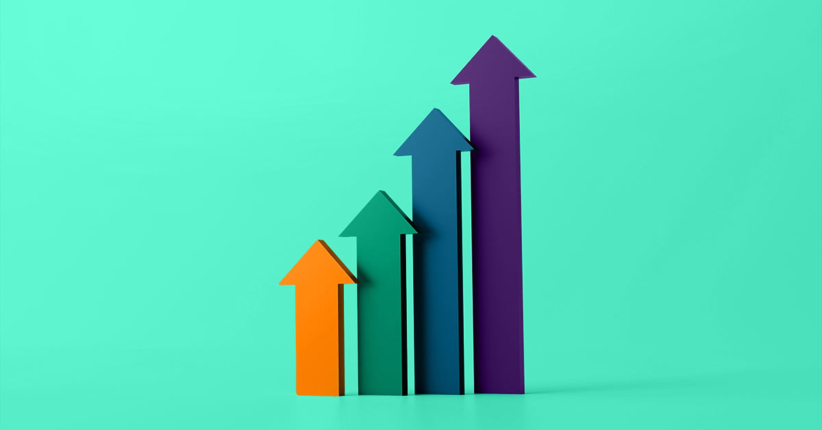 Vertical arrows pointing upward showing goals and growth from the Get on Board with These 2024 Marketing Trends to Take Your Business to the Next Level article by Design At Work