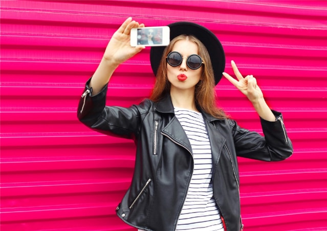 Social Media Influencer taking Selfie